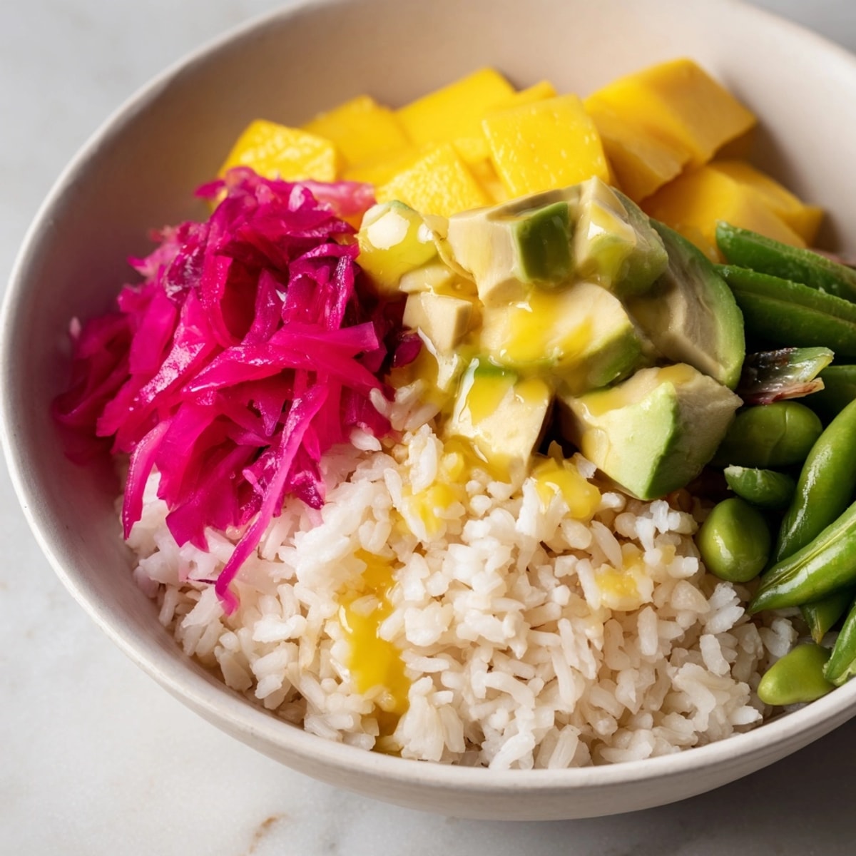 Delicious Mango Avocado Rice Bowl&amp;mdash;a healthy lunch idea bursting with fresh tropical flavors.