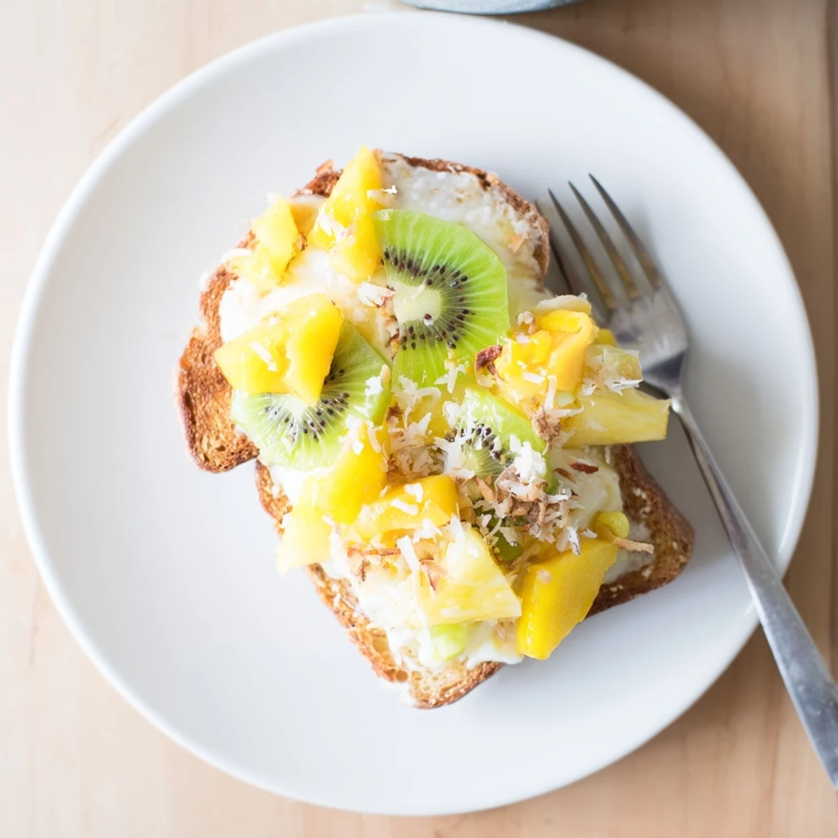 Golden-baked Yogurt-Custard Toast featuring coconut yogurt and kiwi for brunch delight.