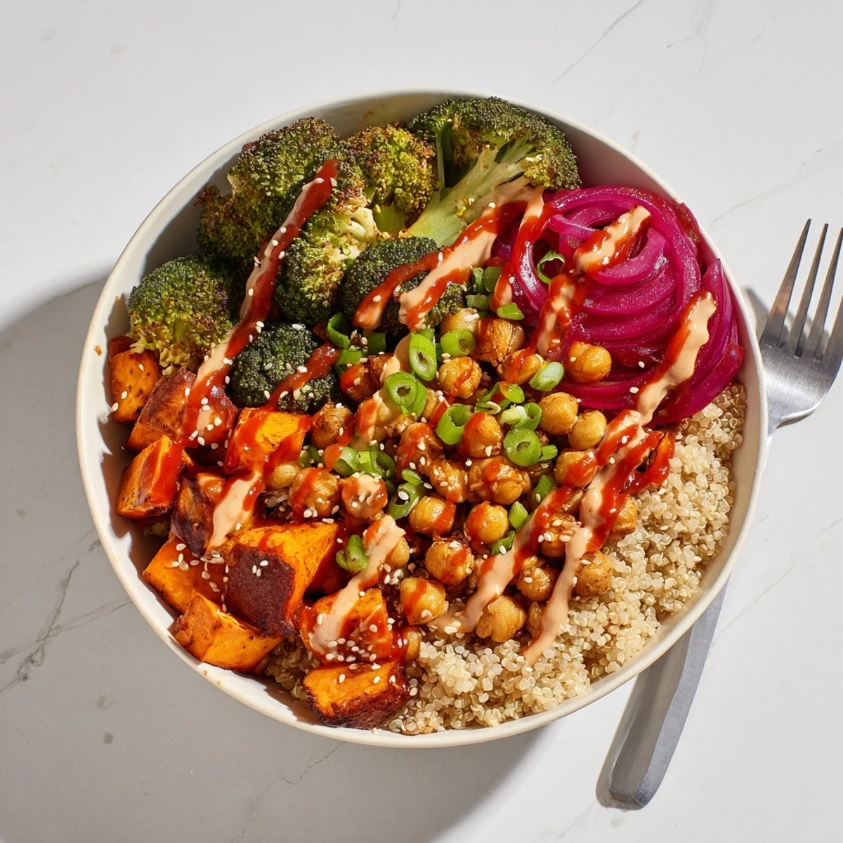 Vibrant Bold Sauce Drizzle Bowls topped with roasted veggies and flavorful sauces.  