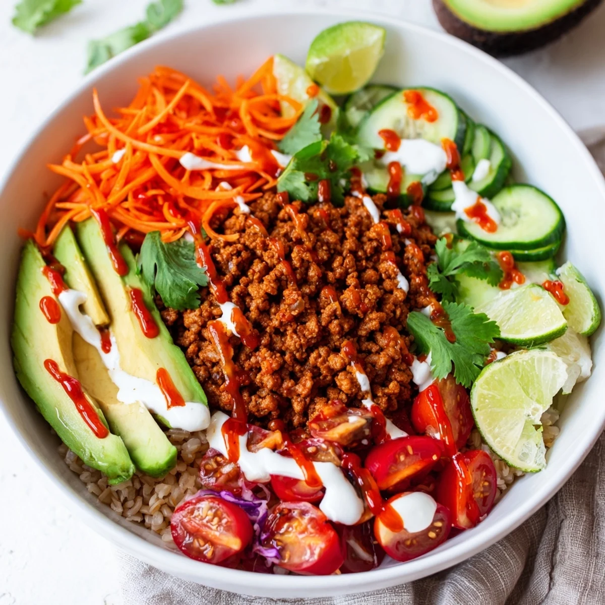 Satisfying plant-based meat bowl featuring avocado and vibrant fresh vegetables.  