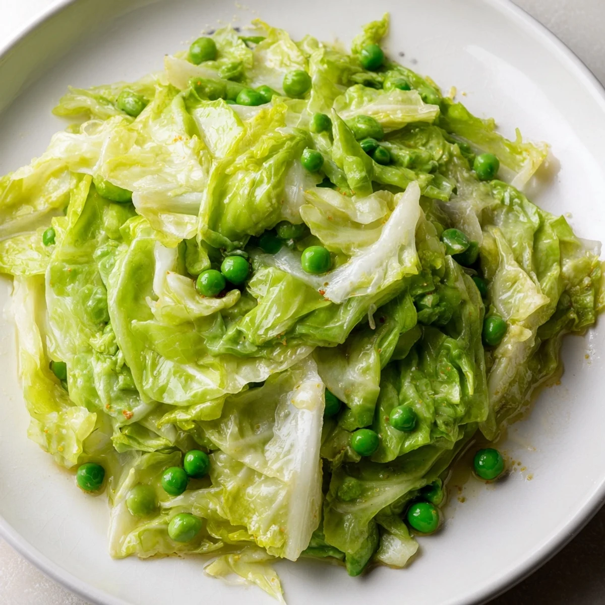 Ready in 20 minutes: a colorful Cabbage Stir-Fry with Garlic, Soy and peas, perfect with rice.