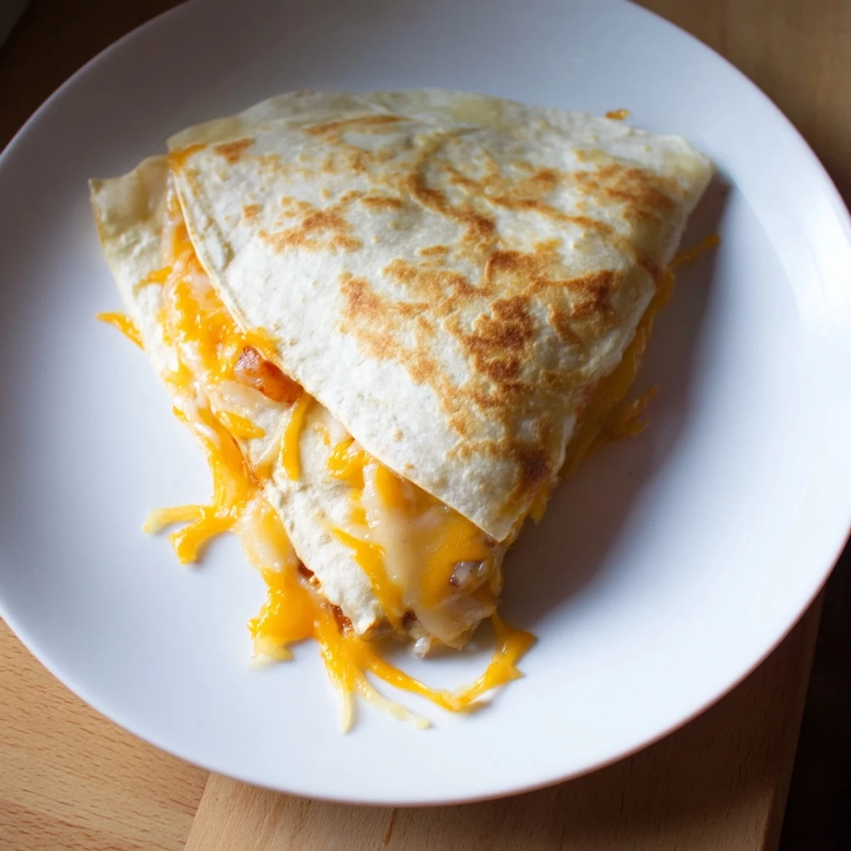 Golden, cheesy Bean & Cheese Quesadillas, a quick and satisfying meal with warm, melty cheese.