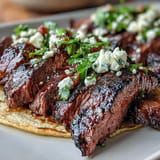 Juicy CARNE ASADA taco bar spread on a festive table for guests.