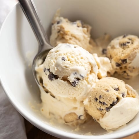 Creamy cottage cheese ice cream adorned with rich cookie dough bites for dessert bliss.