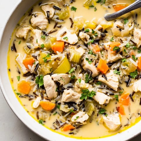 A creamy spoonful of delicious Quick Chicken and Wild Rice Soup, filled with tender chicken and veggies.