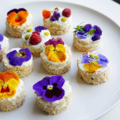 Delicate shortbread cookies adorned with edible flowers star on this Spring Flower Dessert Tray.