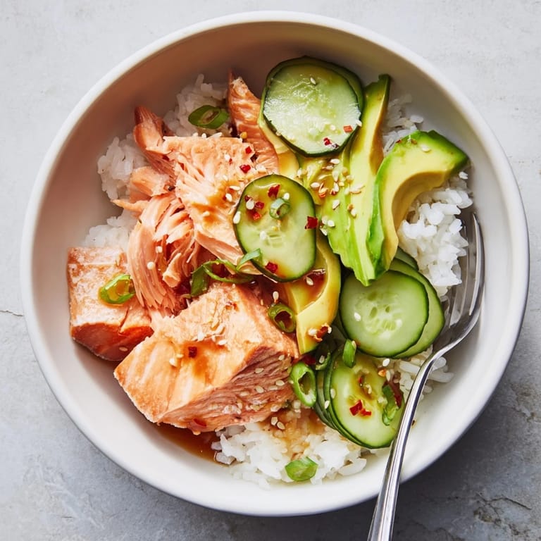 Quick and easy leftover salmon and rice bowl, perfect for a delightful meal.  
