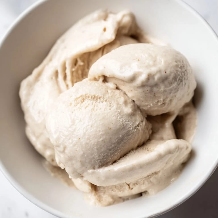 Smooth, frozen 2-Ingredient Banana Ice Cream served, a vegan treat bursting with natural banana flavor.