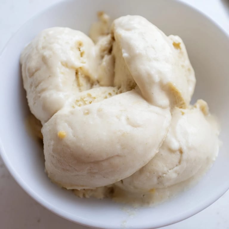 Close-up of freshly blended 2-Ingredient Banana Ice Cream, ready to scoop and enjoy.